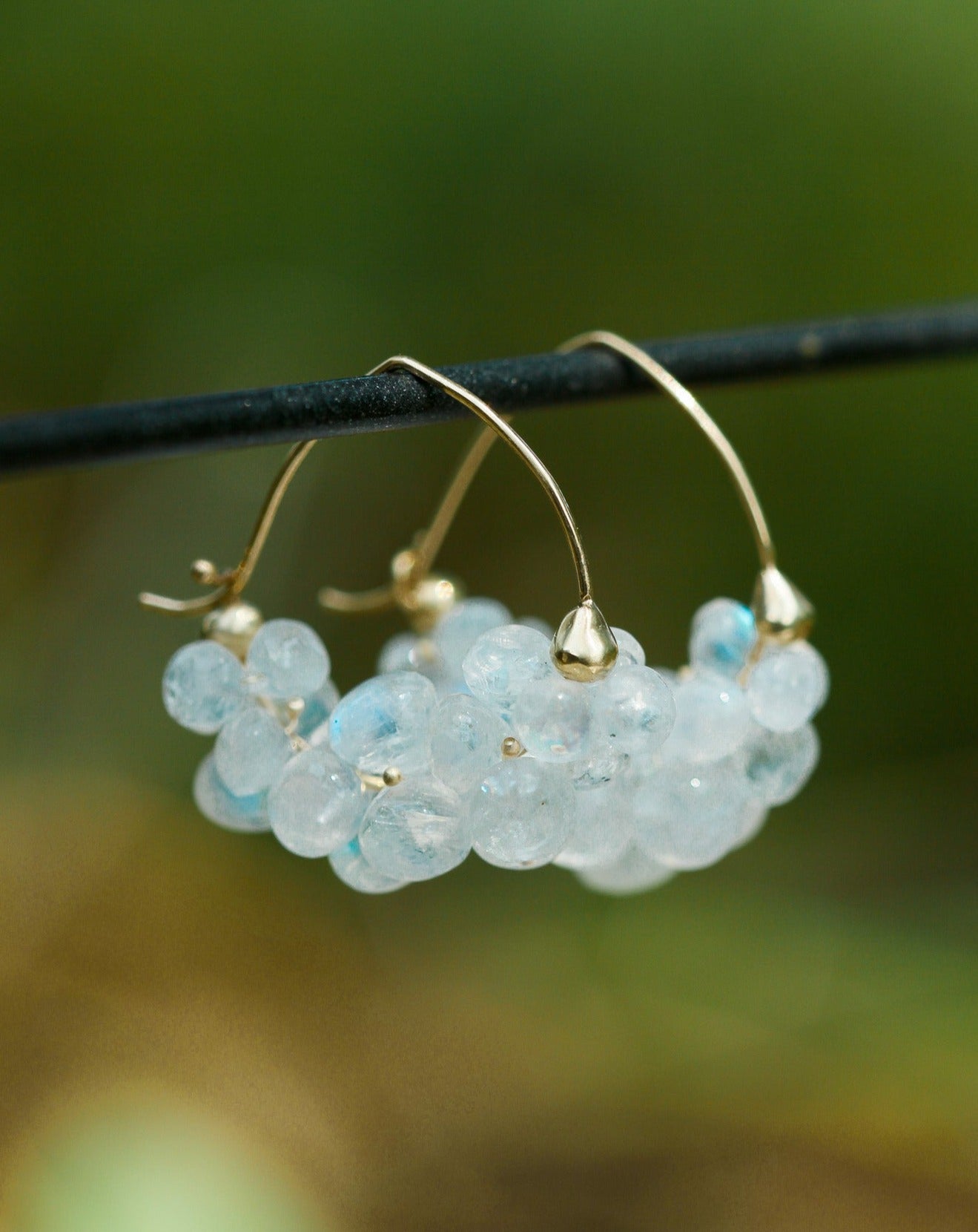 Hoop earrings with rainbow moonstones