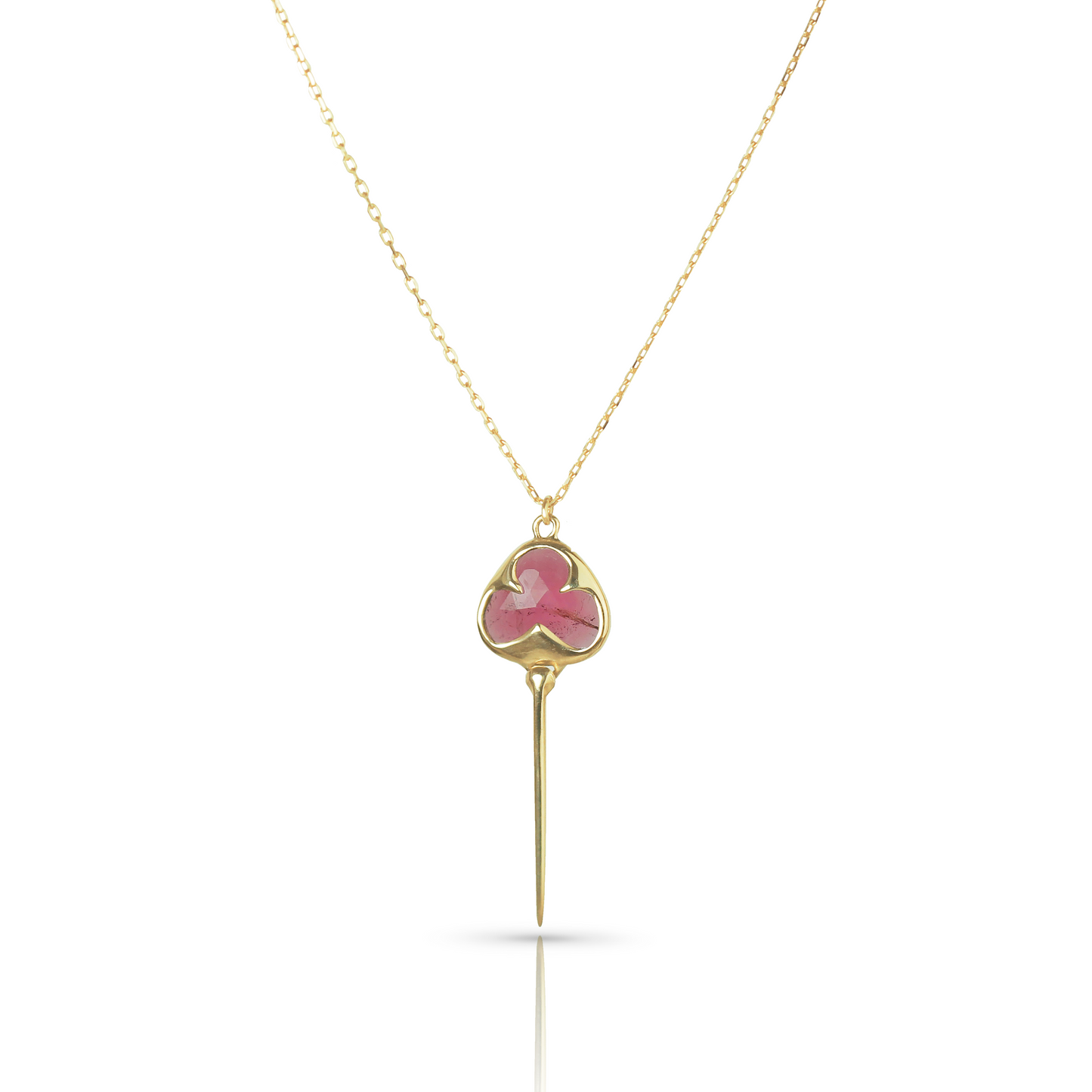 Yellow gold necklace with bezel set pink tourmaline stone, and an elongated gold stingray tail dangling from the bottom, on a dainty gold chain