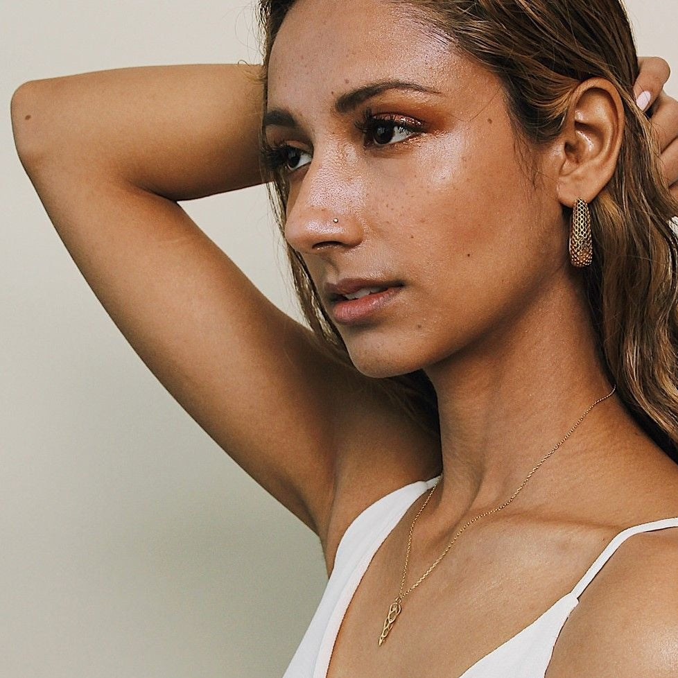 woman wearing hoop earring