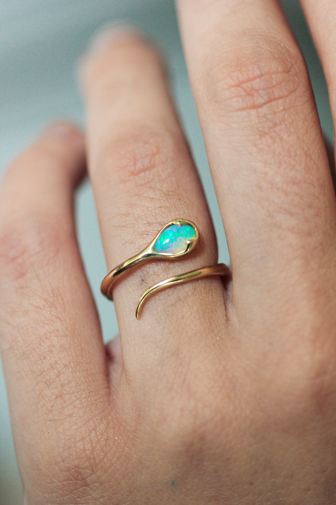 
                  
                    Serpent Ring in Crystal Opal and 18k Gold
                  
                
