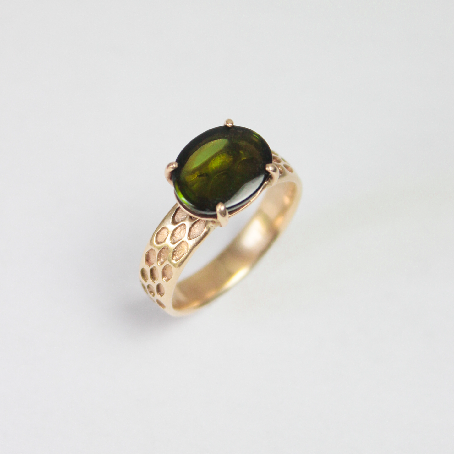 
                  
                    Snakeskin Ring in 14k Gold & Green Tourmaline
                  
                