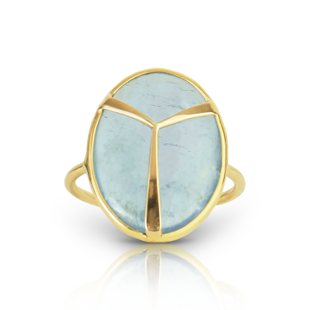 Yellow Gold ring with bezel set, oval shaped, pale blue aquamarine stonstone, with gold beetle wing detail