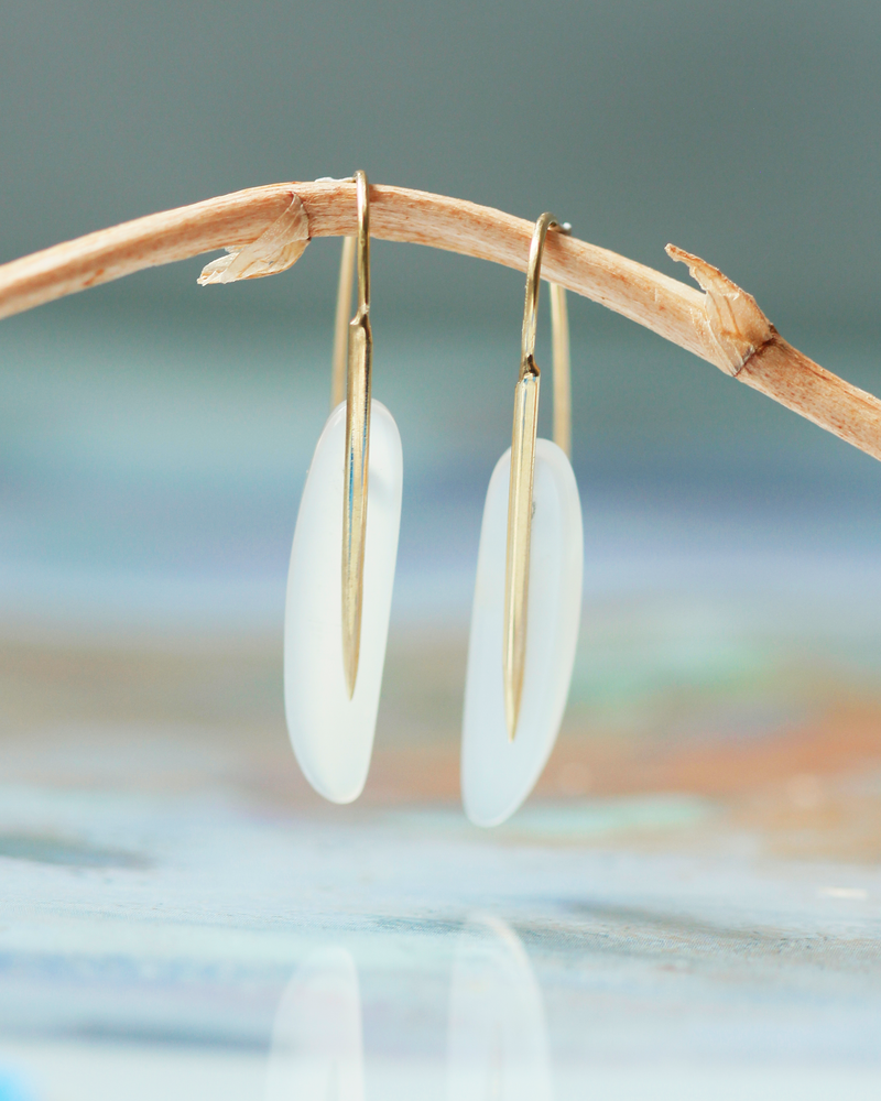 
                  
                    Feather Earrings in White Moonstone and 18k Gold
                  
                