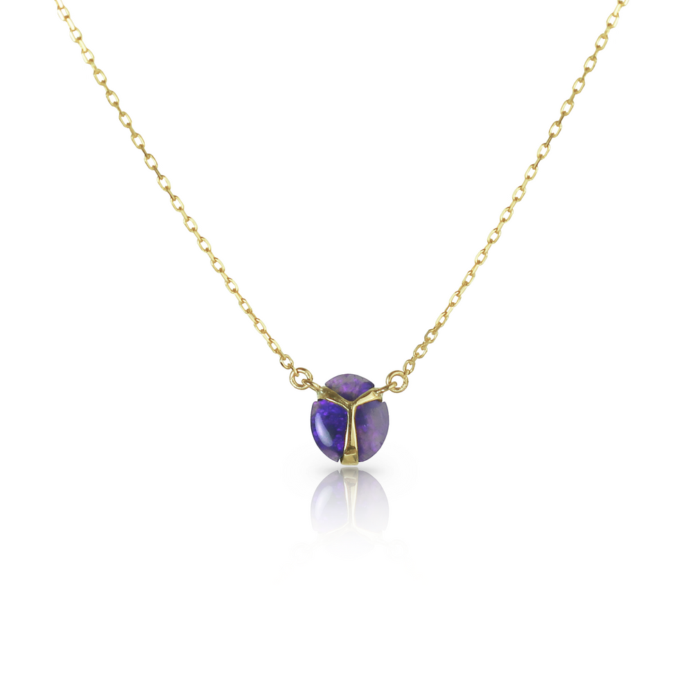 Deep Purple colored opal pendant necklace with yellow gold beetle wing detail, on a yellow gold chain