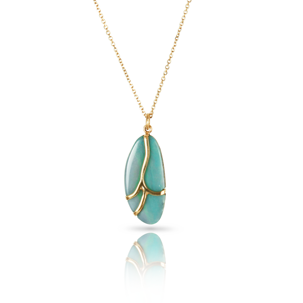 Necklace with blue opal stone, gold butterfly wing details, and gold chain