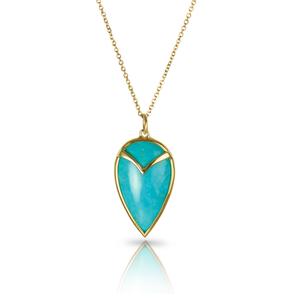 Gold necklace with bezel set, teardrop shaped, turquoise stone on a gold chain