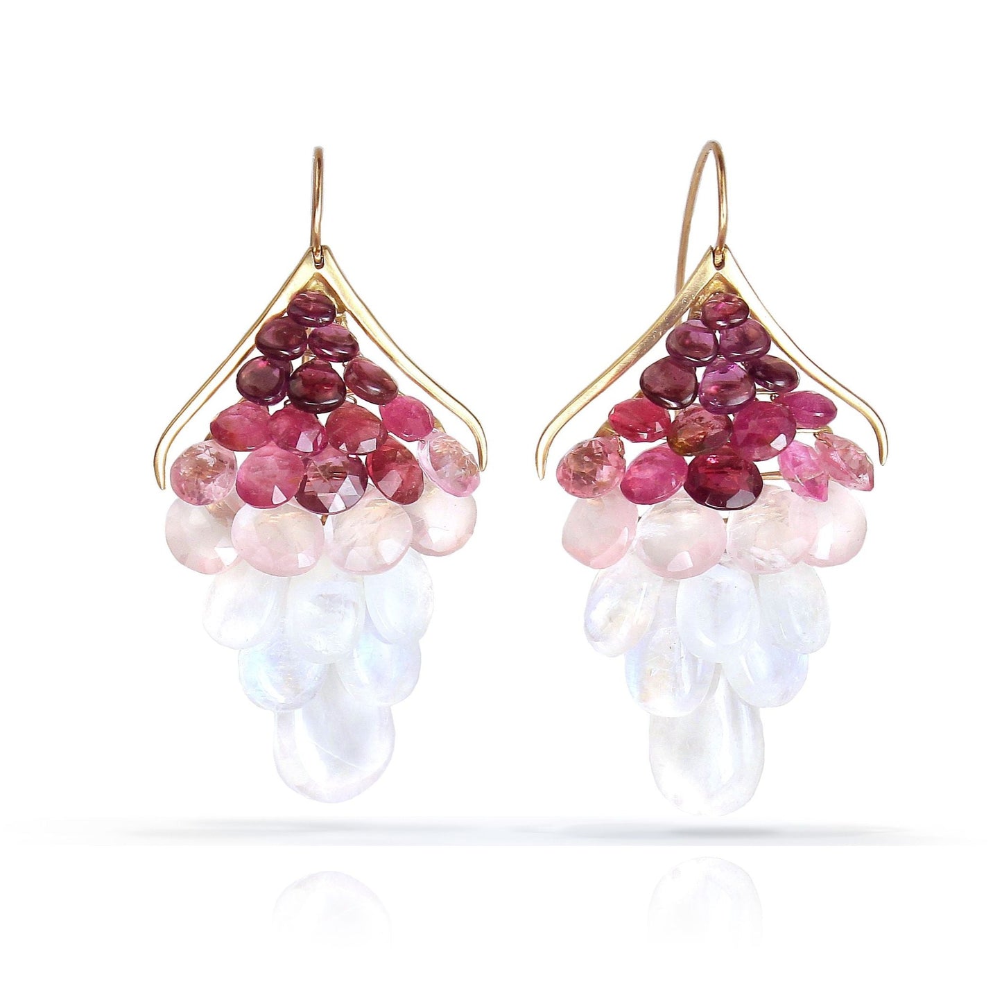 
                  
                    Large Plumage Earrings featuring handpicked ombre gemstones, and elongated ear wires.
                  
                