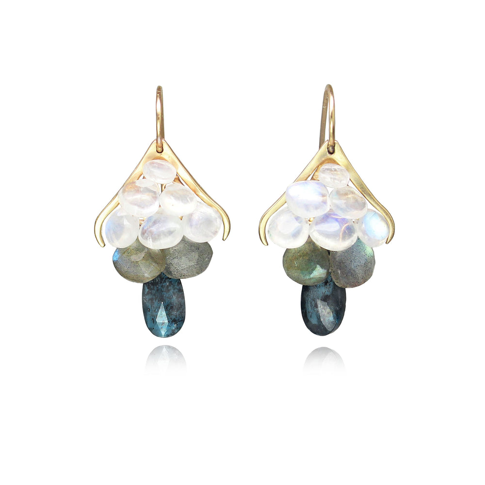 
                  
                    Small Plumage Earrings featuring handpicked ombre gemstones, and elongated ear wires
                  
                